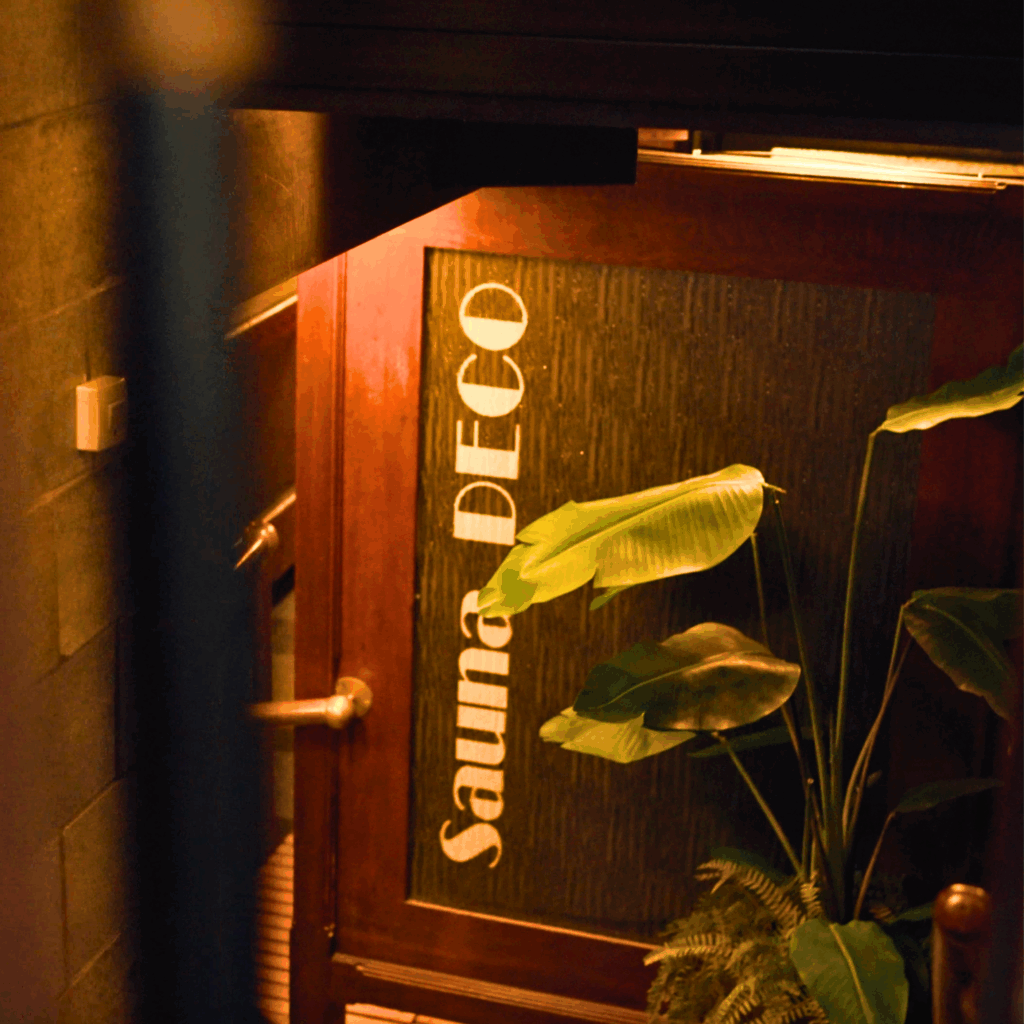 Vintage art deco interior of Sauna Deco in Amsterdam, a historic bathhouse with warm lighting and ornate details.