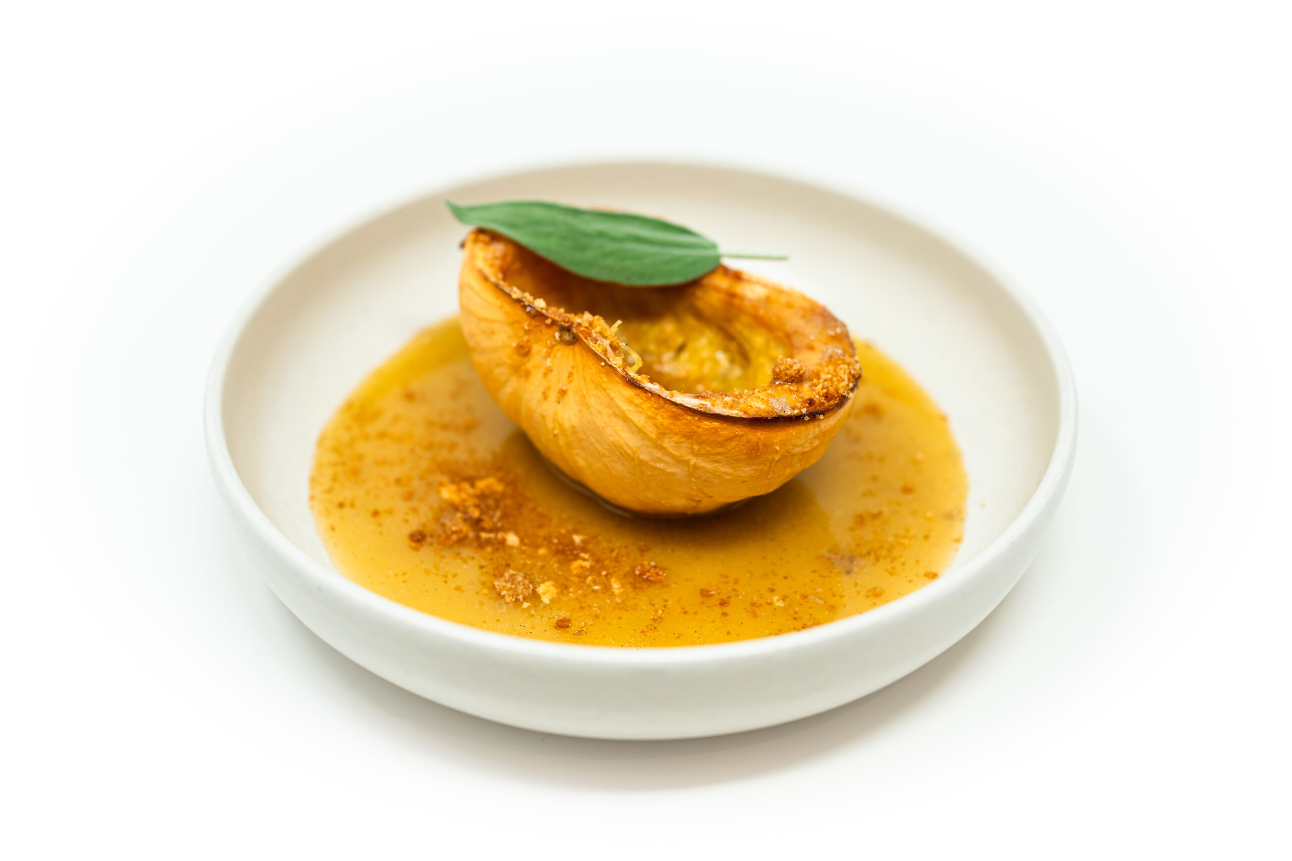 Roasted white pumpkin drizzled with vanilla brown butter sage sauce, topped with crisp sage leaves and a sprinkle of vanilla sea salt.